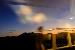 A terrible attempt by Will to capture the mountains at sunset through the lounge car windows at an angle